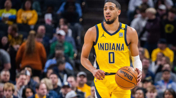 Jan 5, 2024; Indianapolis, Indiana, USA; Indiana Pacers guard Tyrese Haliburton (0) dribbles the ball in the first quarter against the Atlanta Hawks at Gainbridge Fieldhouse. Mandatory Credit: Trevor Ruszkowski-USA TODAY Sports